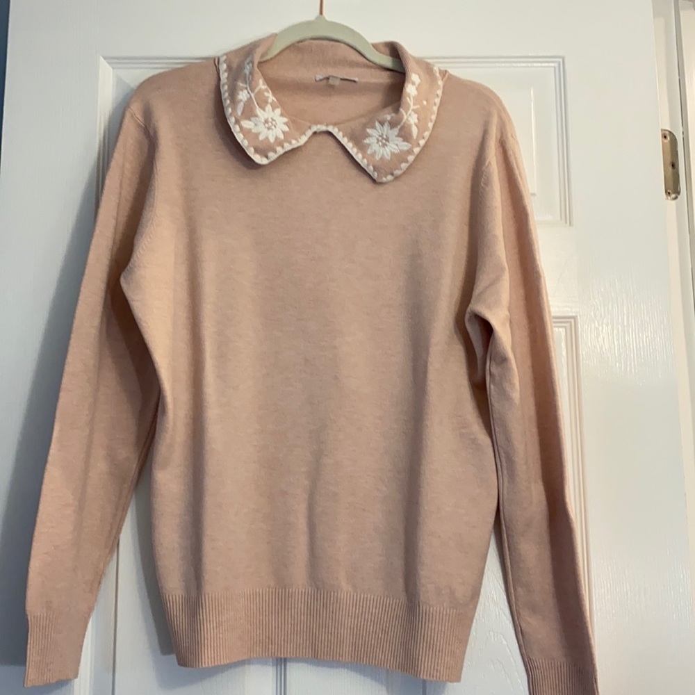 Cute pink light weight sweater. Worn once.